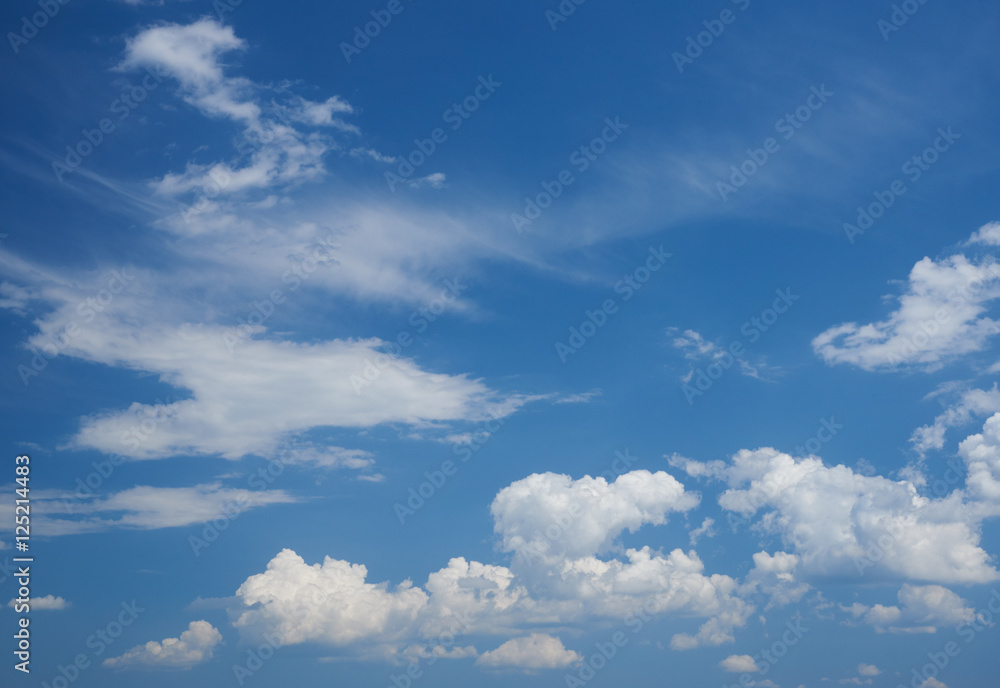 Cirrus and cumulus clouds