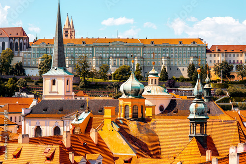 Photography Cityscape view on the roofs and spires in lesser town in Prague