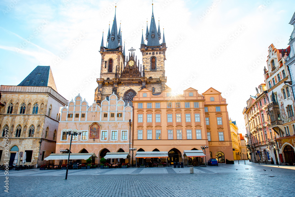 View on the old town square with famous Tyn cathedral on the sunrise in Prague