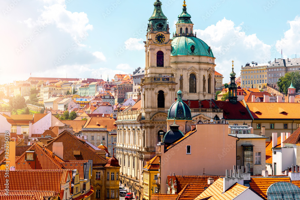 Cityscape view on the lesser town with saint Nicholas church in Prague city - obrazy, fototapety, plakaty 