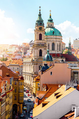 Fototapete Prag Stadtbildansicht auf die kleinere Stadt mit der Sankt-Nikolaus-Kirche in Prag-Stadt  © rh2010