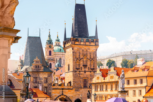 Photography View on the Lesser town with bridge tower and saint Nicholas church in Prague ci