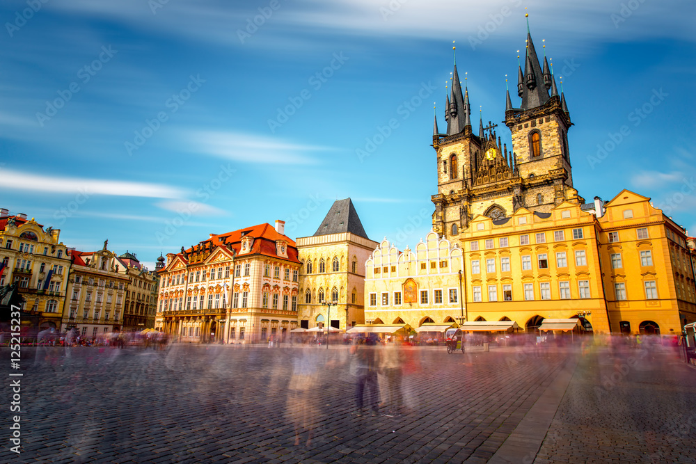 View on the famous cathedral on the old town square in Prague city. Long exposure image technic with blurred people and clouds
