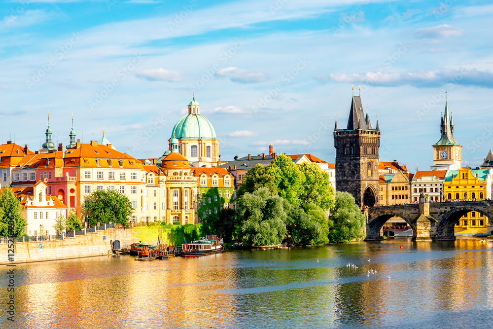 Citycsape view on the riverside with the bridge and old town in Prague Citycsape view on the riverside with the bridge and old town in Prague