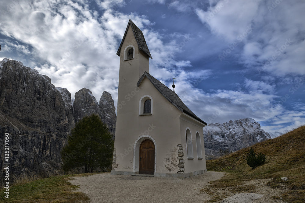 Church on a hill in the Dolomites
