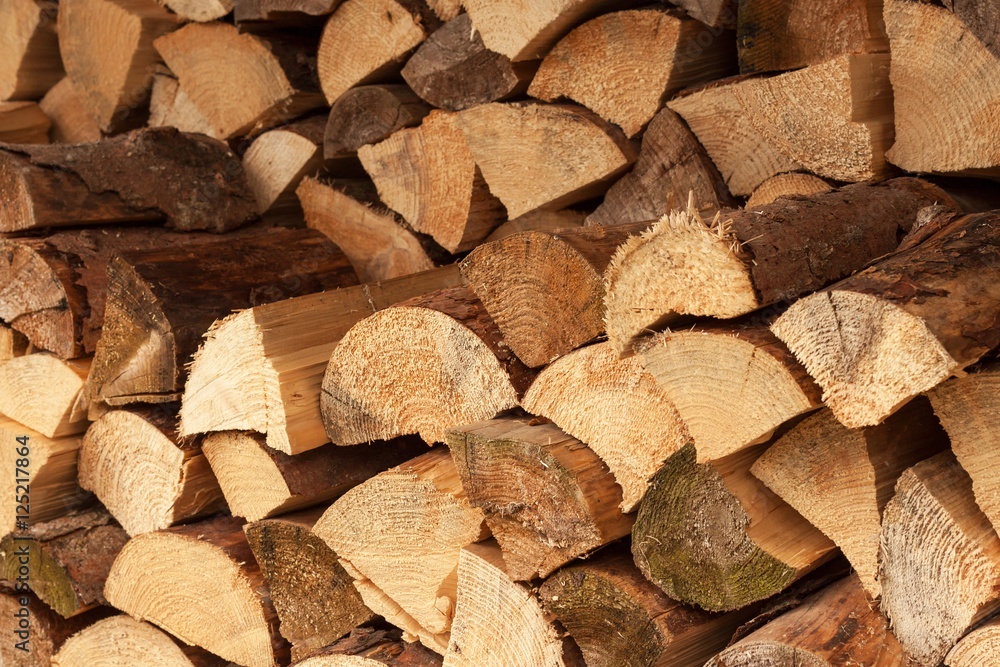 wall firewood , Background of dry chopped firewood logs in a pile. Stack of logs felled and left to dry.
wall firewood , Background of dry chopped firewood logs in a pile. Stack of logs felled and left to dry.