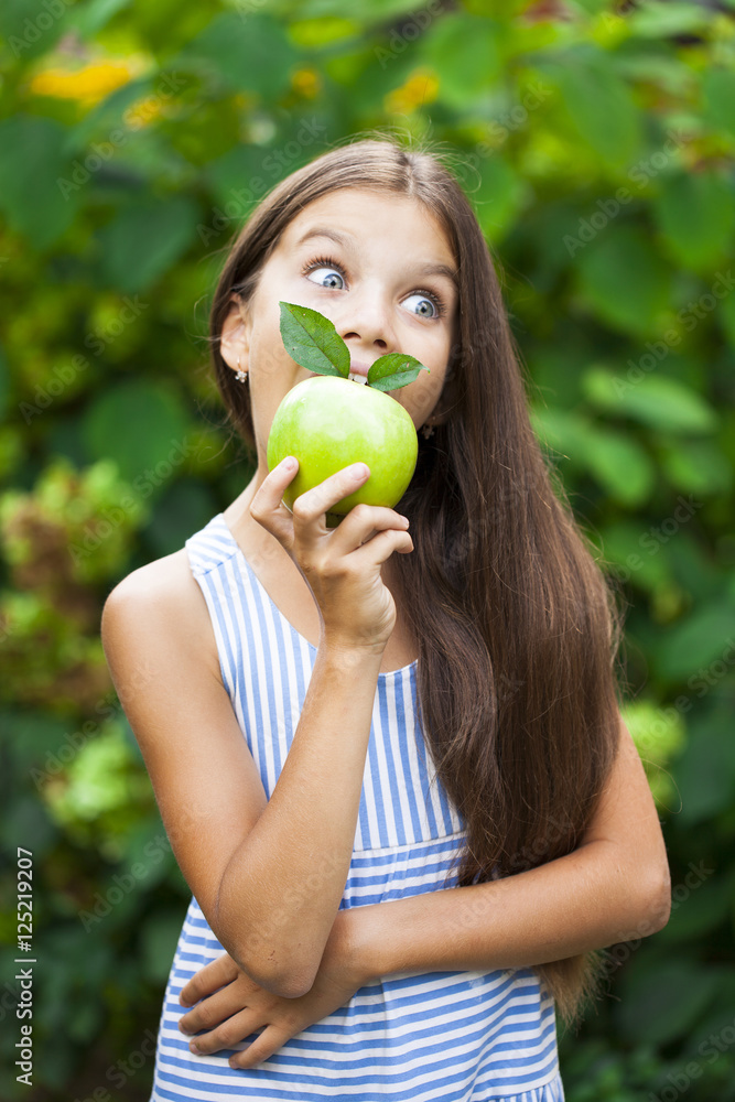 Picture of beautiful girl with green apple Picture of beautiful girl with green apple