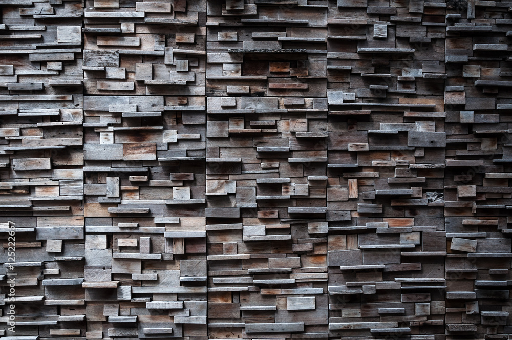 exposed wooden wall exterior, patchwork of raw wood forming a beautiful parquet wood pattern,Wood wall pattern,for background exposed wooden wall exterior, patchwork of raw wood forming a beautiful parquet wood pattern,Wood wall pattern,for background