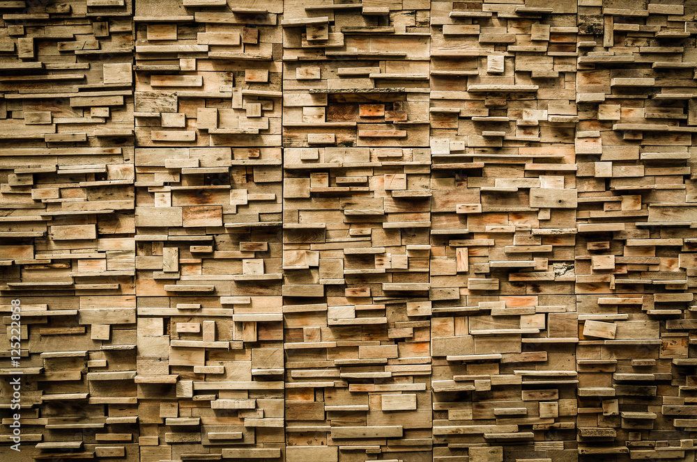 exposed wooden wall exterior, patchwork of raw wood forming a beautiful parquet wood pattern,Wood wall pattern,for background exposed wooden wall exterior, patchwork of raw wood forming a beautiful parquet wood pattern,Wood wall pattern,for background