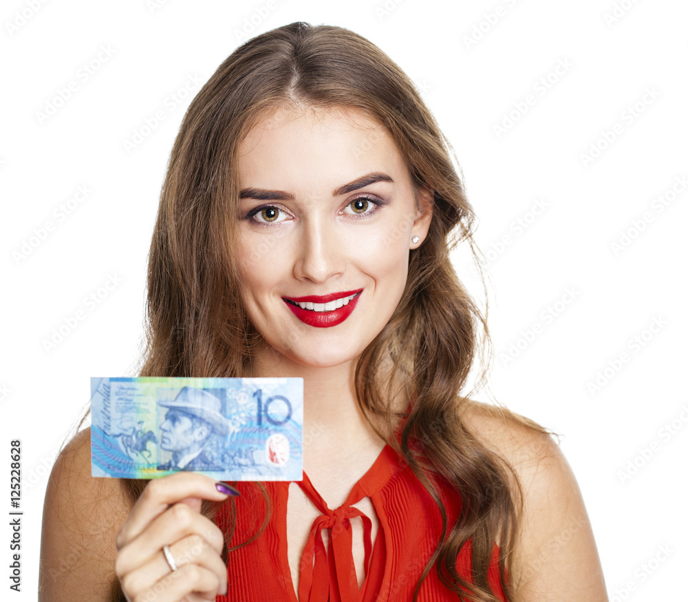 Brunette woman holds 10 Australian dollar Banknote. Isolated on Brunette woman holds 10 Australian dollar Banknote. Isolated on