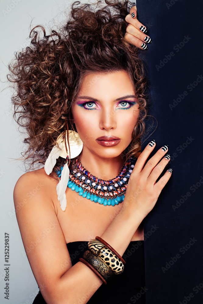 Beautiful Woman Fashion Model with Curly Hairstyle and Makeup