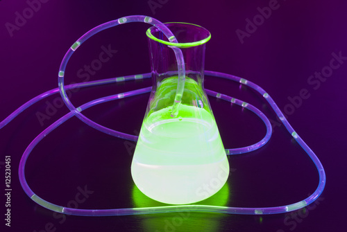Flask filled with glowing liquid