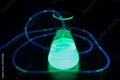 Flask filled with glowing liquid