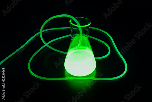 Flask filled with glowing liquid