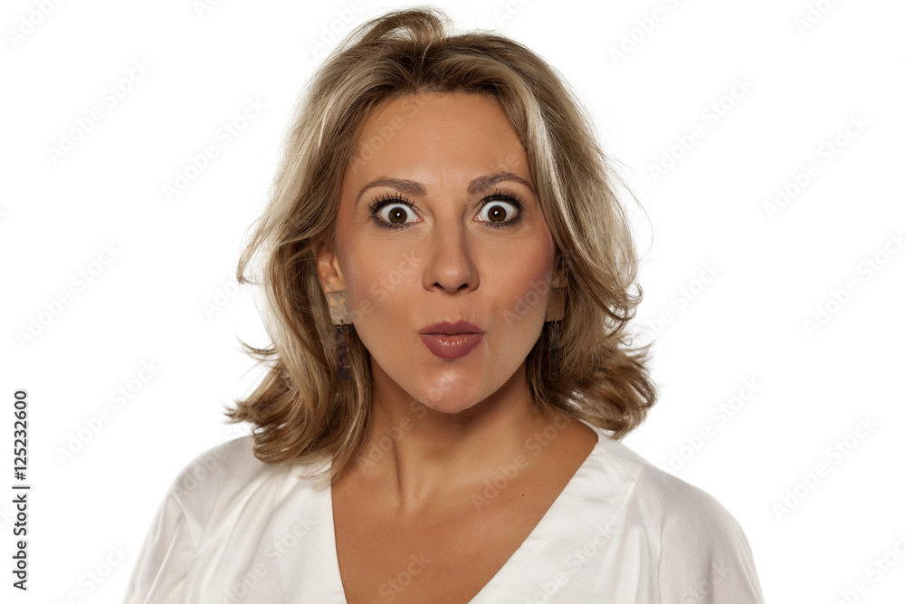 middle-aged pretty woman with wide open eyes middle-aged pretty woman with wide open eyes