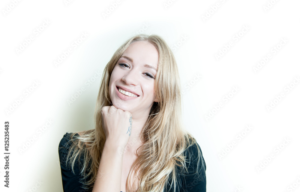 Smiling young blonde woman portrait isolated Smiling young blonde woman portrait isolated