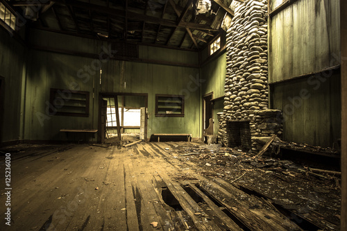 Abandoned Home In Great Smoky Mountains National Park.Interior of Elkmont district home known as Millionaire's Row. The abandoned  homes have been left to decay since purchased for the National Park. photo