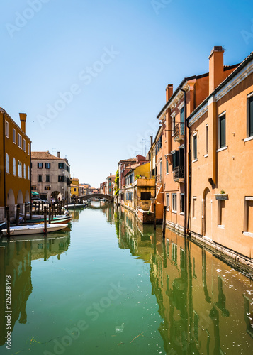 Chioggia houses create colorful reflections in the water of the © isaac74