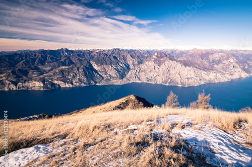 Panorama of Lake Garda seen from the top of Mount Baldo, Italy.