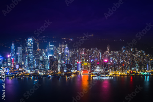 Night aerial view panorama of Hong Kong skyline and Victoria Harbor. Travel destinations © PerfectLazybones