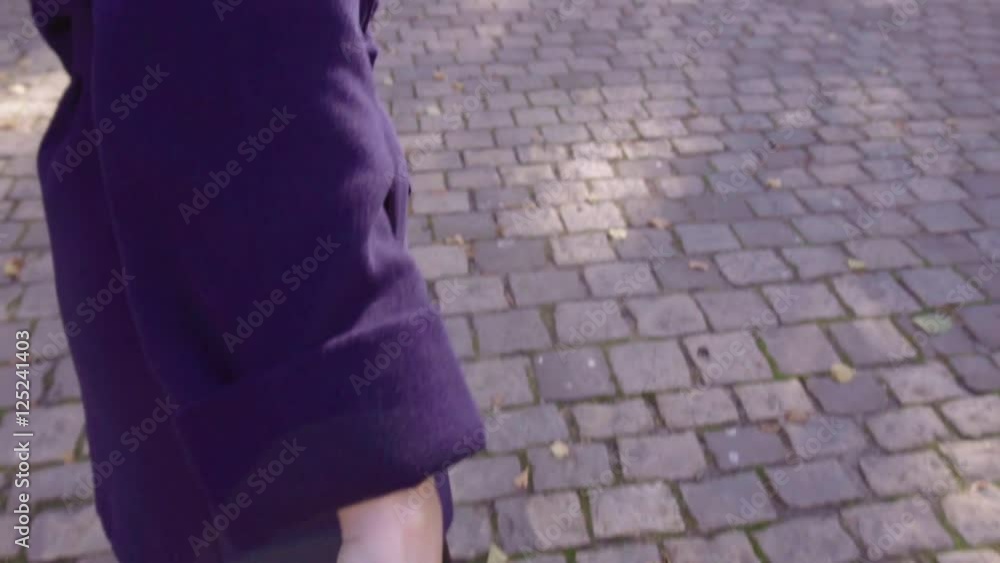 Woman leads a man holding his hand Woman leads a man holding his hand