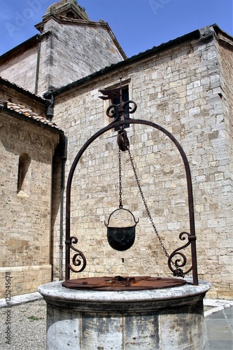 Medieval well in San Quirico d'Orcia, Siena, tuscany , Italy 