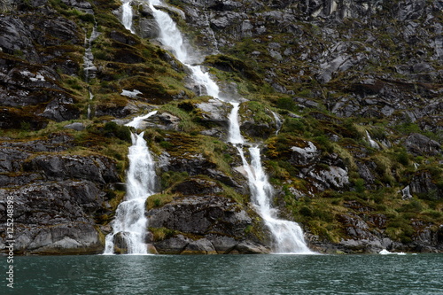 Waterfalls Nena glacier on the archipelago of Tierra del Fuego.