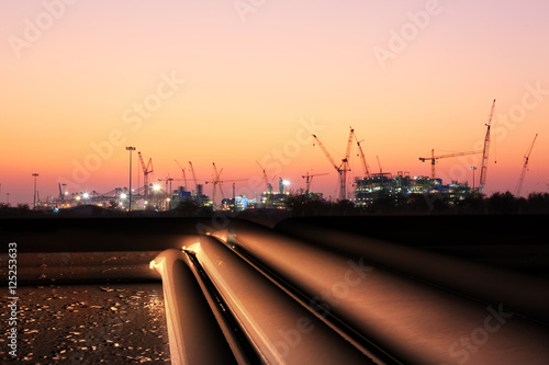  pipelines heavy industry : Tubes running in the direction of Pipeline transportation is most common way of transporting goods such as Oil, natural gas or water on long distances.