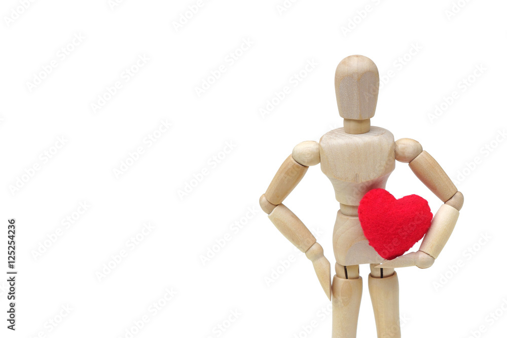 Wood Figure Mannequin holding a red heart on white background Wood Figure Mannequin holding a red heart on white background