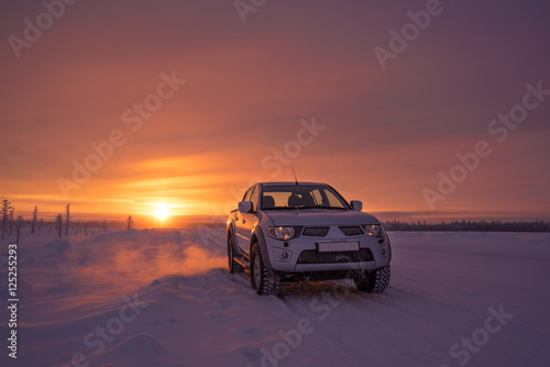 car on the winter road © Andrey Snegirev