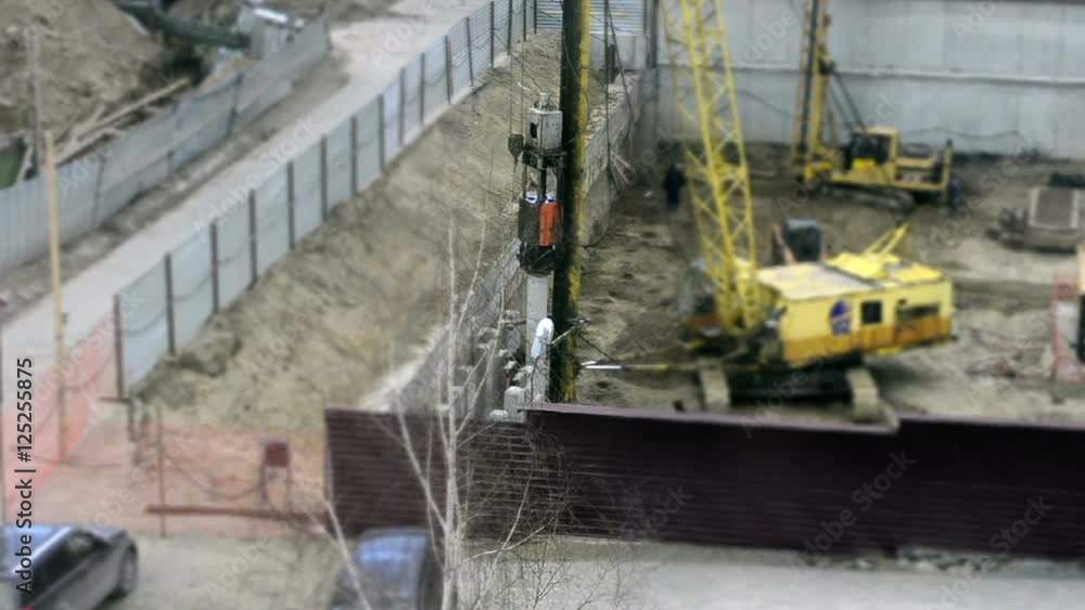 hammering concrete pile at construction site. Timelapse hammering concrete pile at construction site. Timelapse