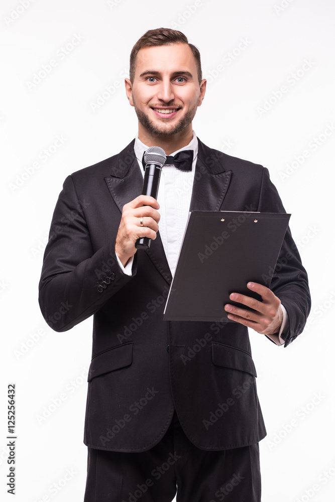 The Showman interviewer with blank. Young elegant man holding microphone against white background.Showman concept. The Showman interviewer with blank. Young elegant man holding microphone against white background.Showman concept.