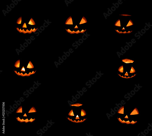 eight halloween pumpkins frame on black background