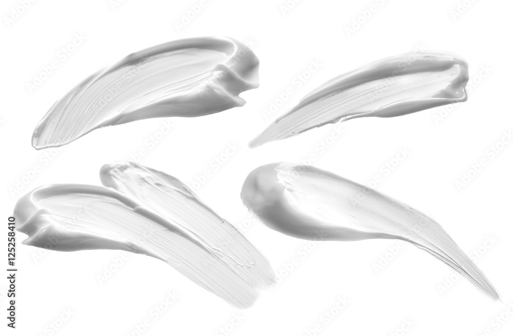 Fotografie Beauty cream samples on white background.
