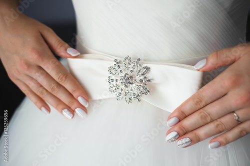 Valokuvatapetti Bride wedding details - wedding dress