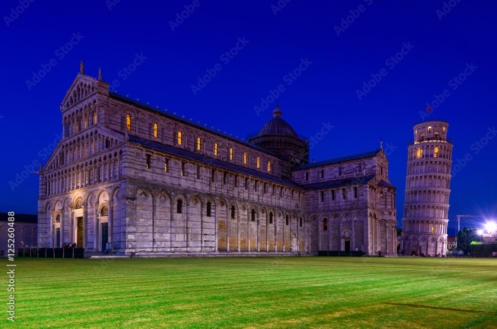 Night view of Pisa Cathedral (Duomo di Pisa) with the Leaning Tower of Pisa (Torre di Pisa) on Piazza dei Miracoli in Pisa, Tuscany, Italy