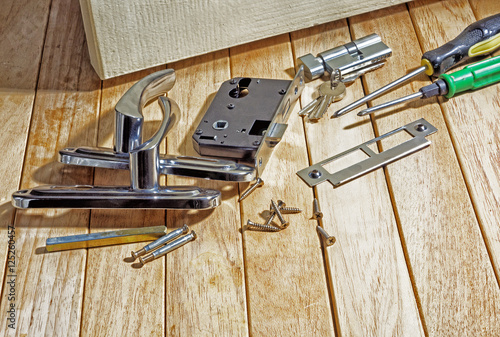 Tools and mortise lock before installing the door. photo