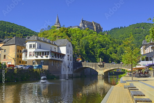 Schilderij op canvas The beautiful medieval castle in Vianden, a small village in Luxembourg and embankment on the Our river