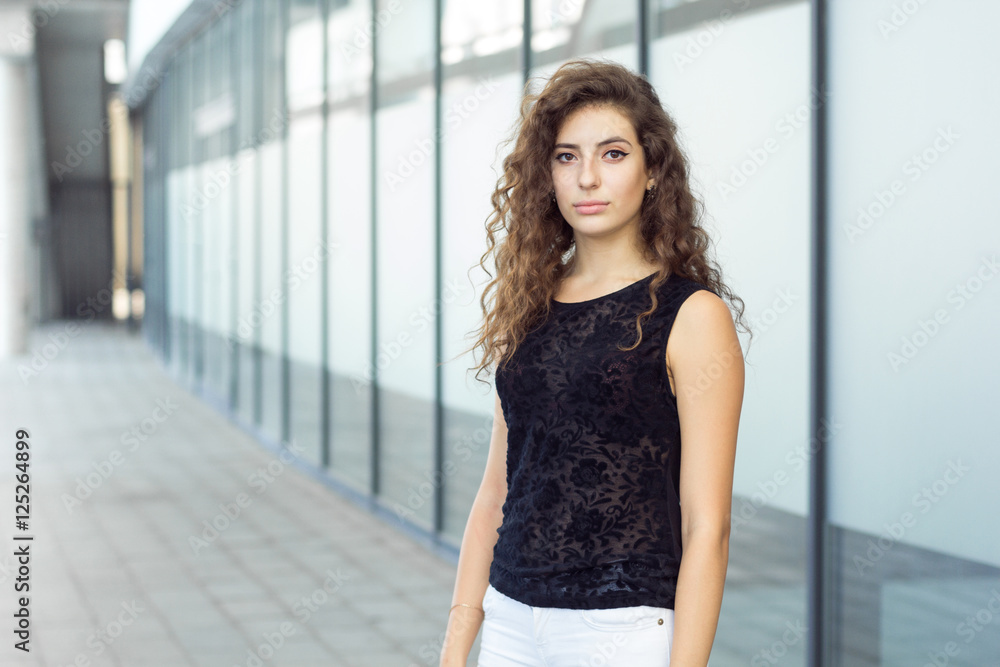Sad girl standing on the street Sad girl standing on the street
