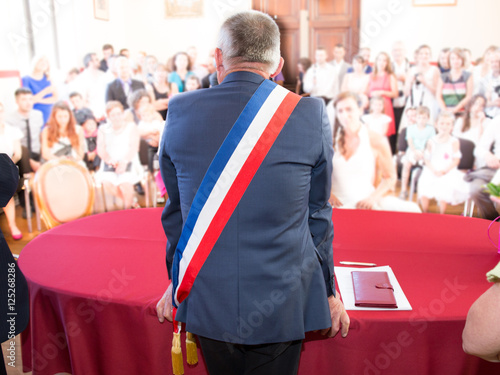 Back of French mayor with a scarf flag photo