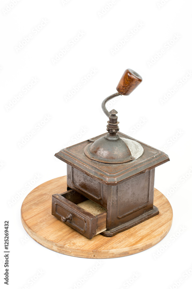Old rustic wooden hand mill for coffee and spices Old rustic wooden hand mill for coffee and spices