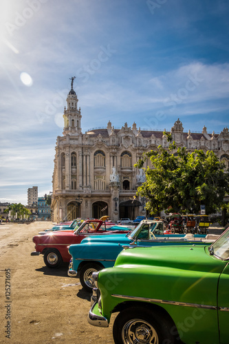 Photography Cuban colorful vintage cars in front of the Gran Teatro - Havana, Cuba