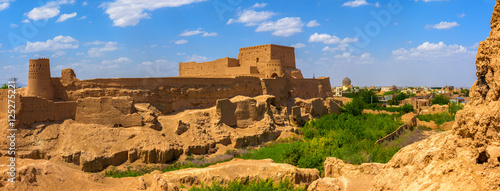 old clay fortress over the city of Meybod in Iran photo