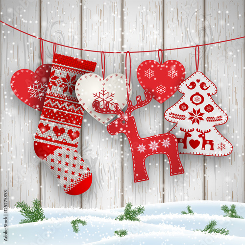 Christmas folklore decorations hanging in front of white wooden wall, illustration