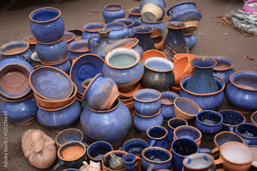Traditional Ceramic Jugs.Handmade Ukraine Ceramic Pottery in a Roadside Market with Ceramic Pots and Clay Plates Outdoors. Traditional Ceramic Jugs.Handmade Ukraine Ceramic Pottery in a Roadside Market with Ceramic Pots and Clay Plates Outdoors.