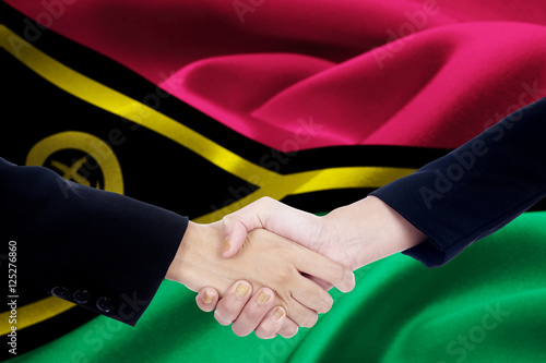 Two hands with flag of Vanuatu