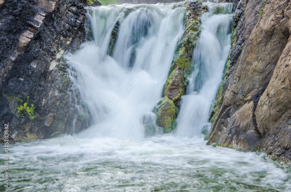 falling water in the morning mist.