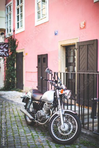  Motorcycle on a background of a pink wall