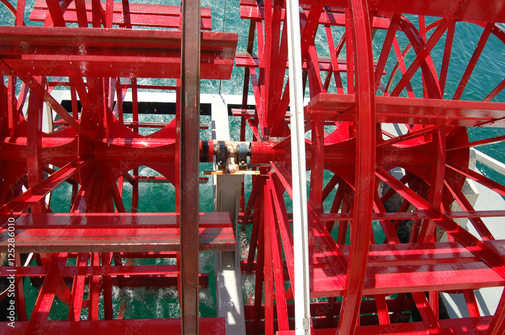 paddle wheel boat wheel in closup red paddle wheel boat wheel in closup red