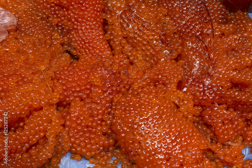 Red caviar close up. The texture of caviar. Sea food. Healthy eating. Diet.